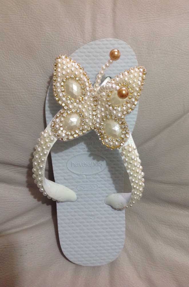 This children's embroidered slipper with pearl butterfly is a treat