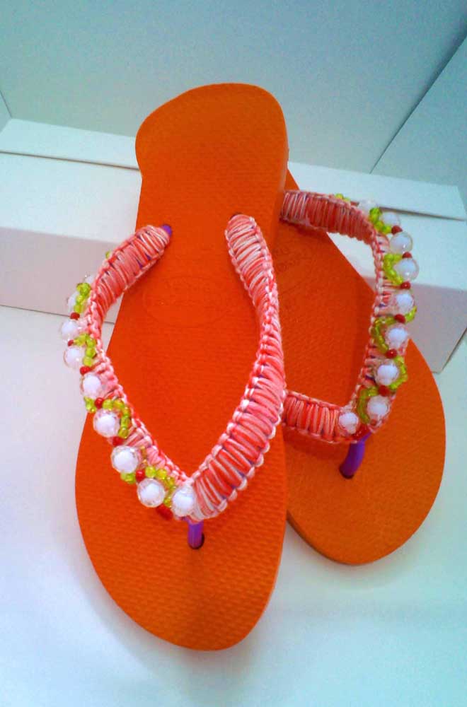 Orange embroidered slipper with summer face