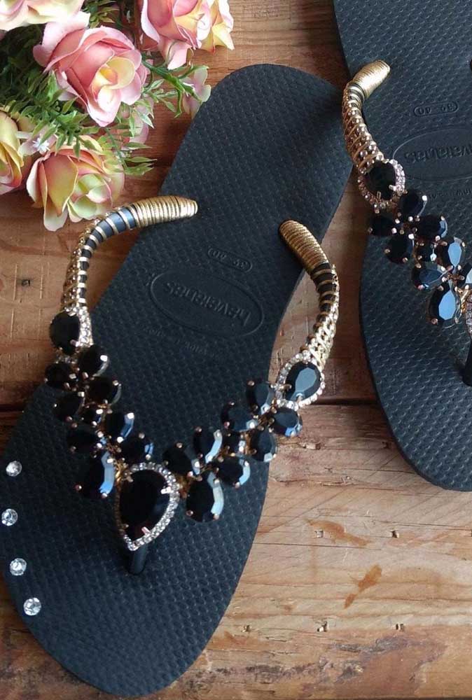 And here, the charm is black slippers with black stones. The contrast is due to the golden