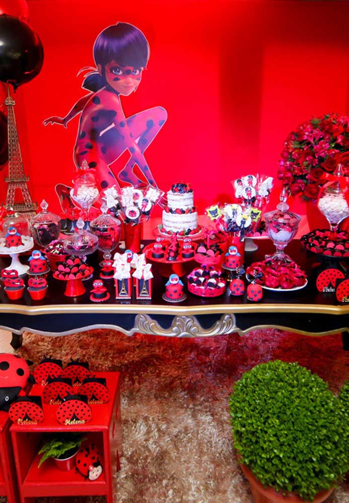 Candy table decorated for Ladybug party. Red is the main color around here