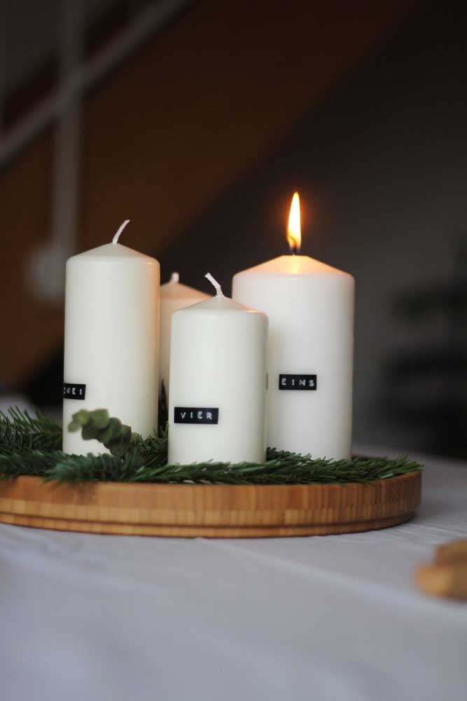 White Christmas candles. The charm here is the typewriting letters on the candle