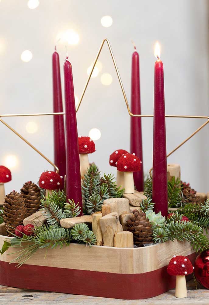 Here, Christmas candles surround the golden star 