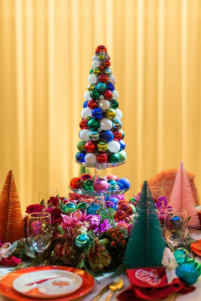 Super colorful Christmas table arrangement of Christmas trees