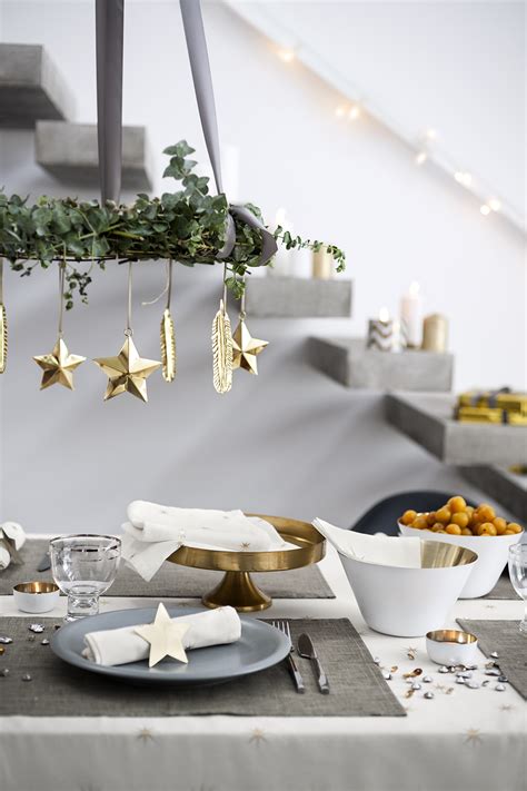 Christmas table with hanging decoration to bring more magic to this special night