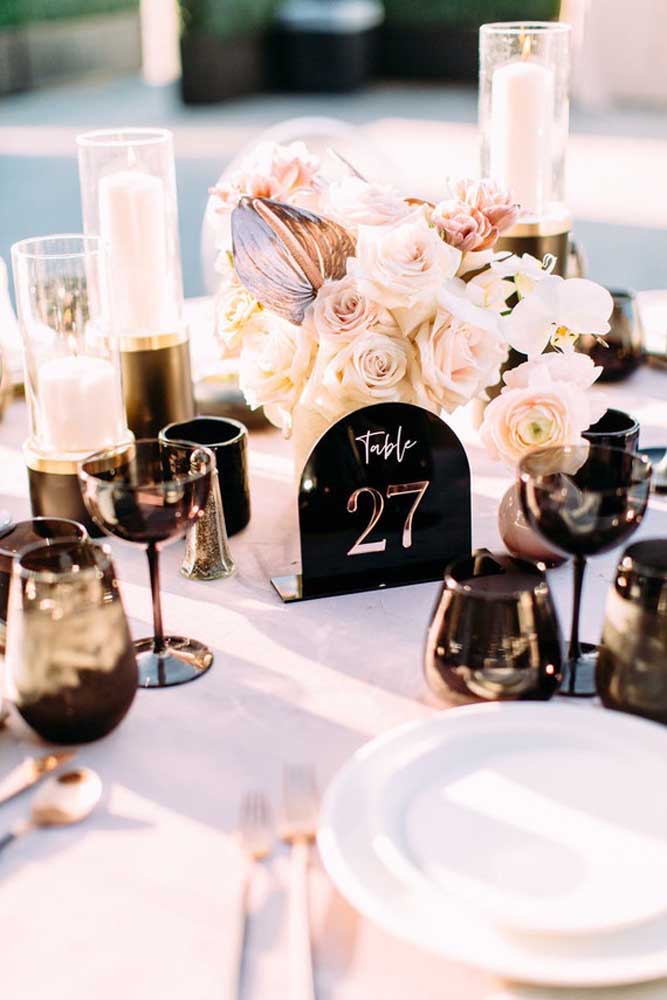 Flowers and candles in the masquerade centerpiece