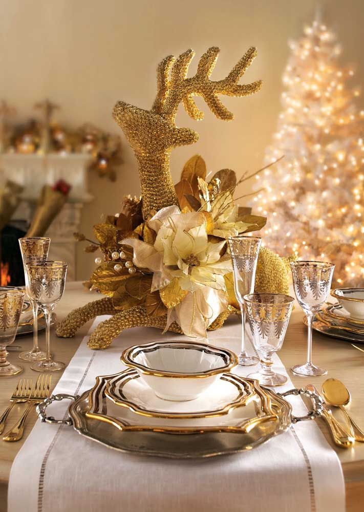 A golden reindeer to match the dishes on the table