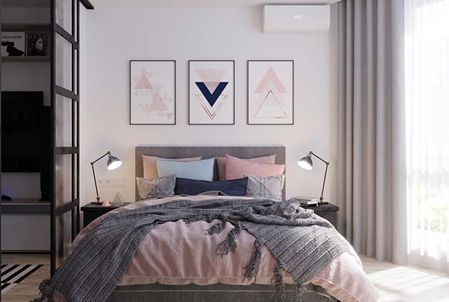 Frames of geometric shapes matching the colors of the bed