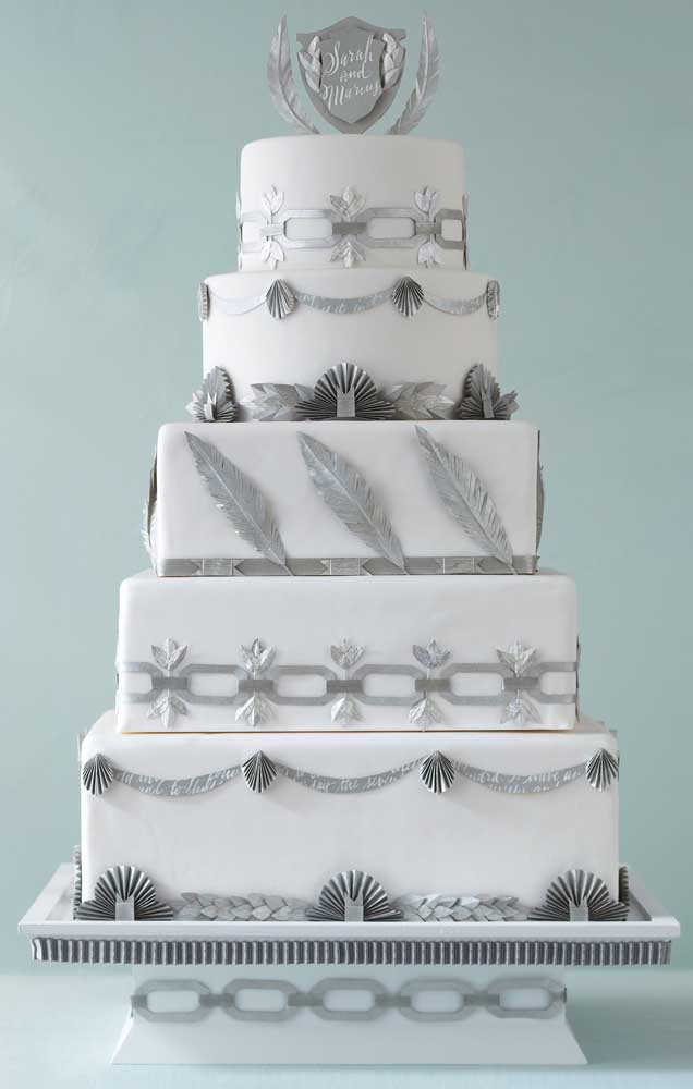 A metallic touch on the white five-story fake cake