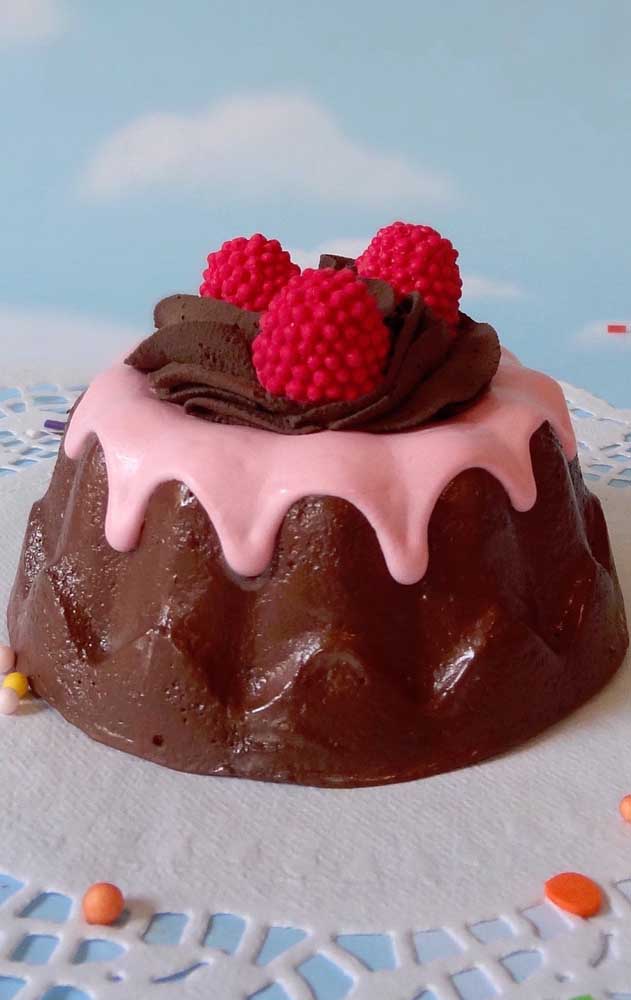 Chocolate cake with strawberry sauce. But it's fake, okay?
