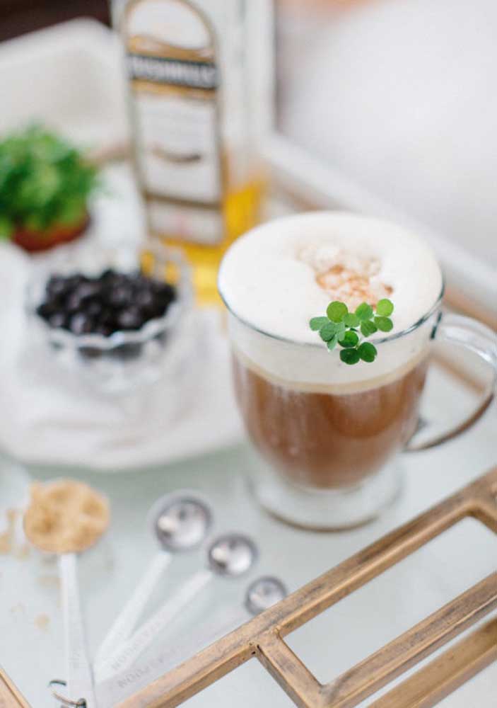 Irish coffee served with natural clover leaves, isn't it?
