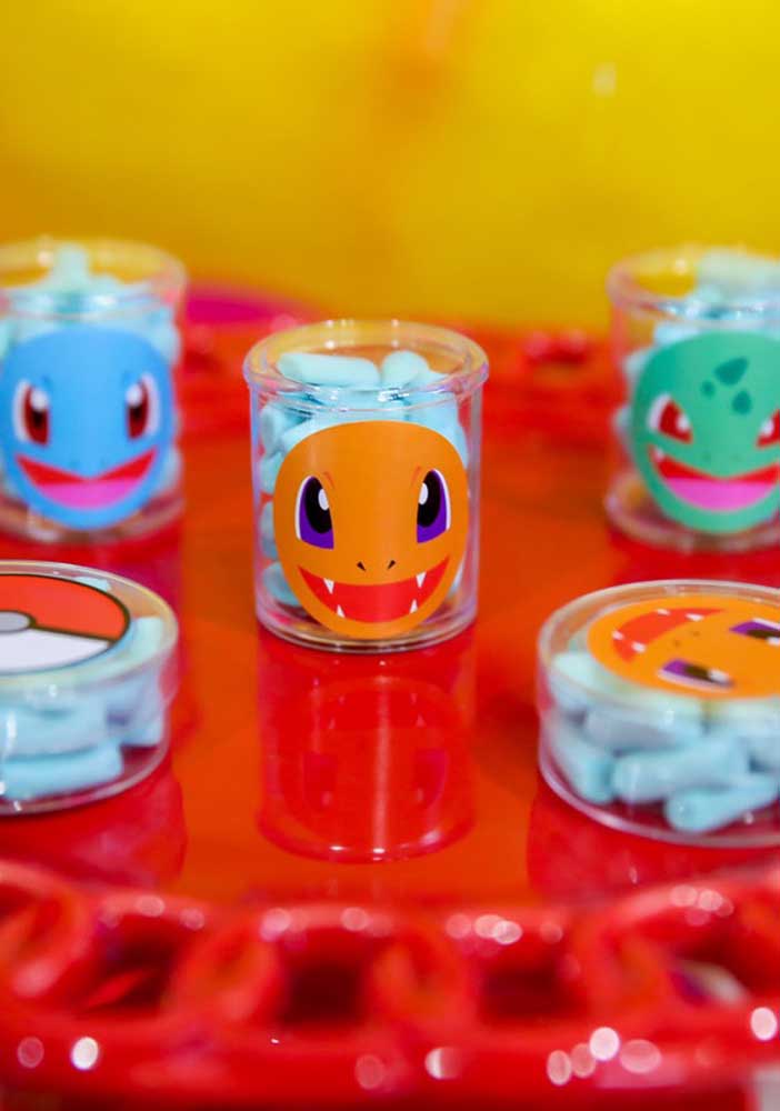 Glue stickers with the faces of the pokemon monsters on the candy packaging.