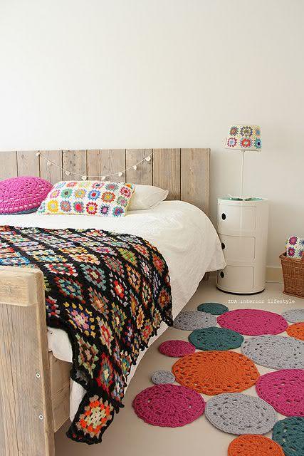 Crochet rug with colorful balls