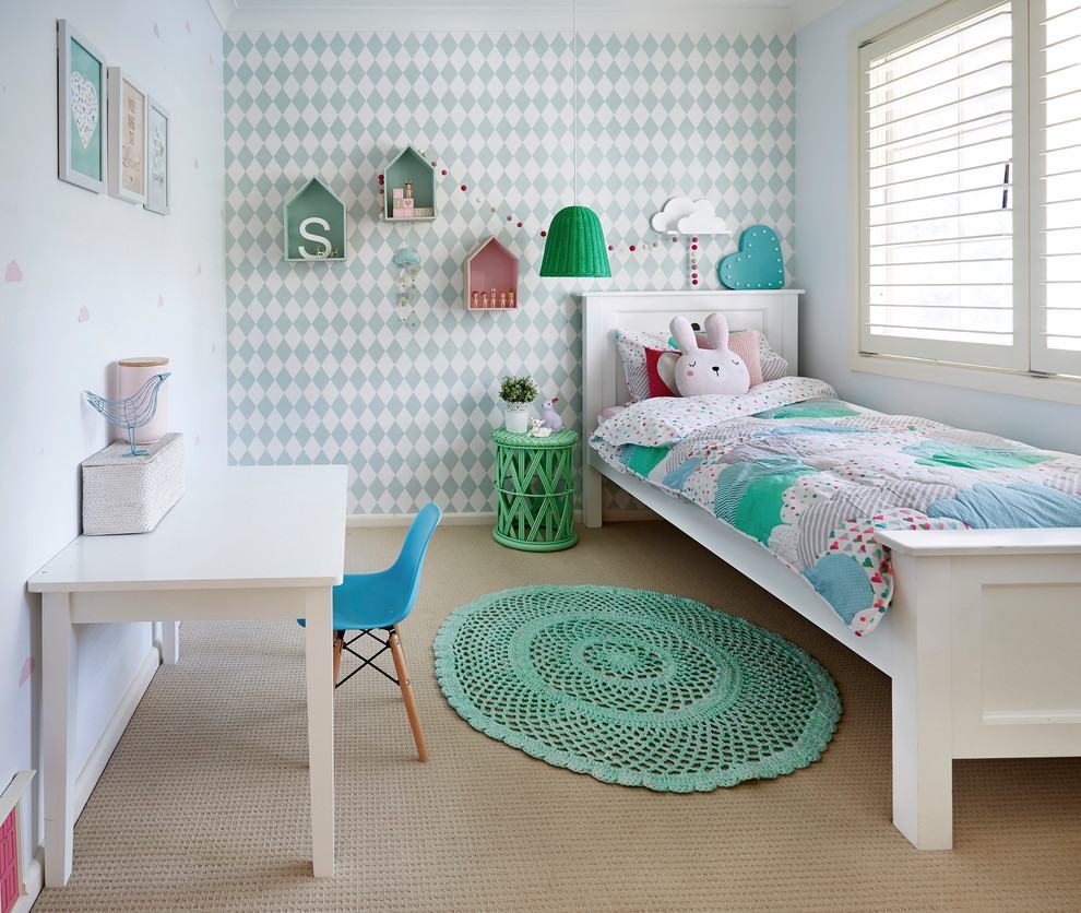 Beautiful baby room with soft green colors matching the crochet rug