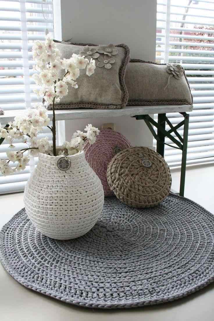 Round gray crochet rug