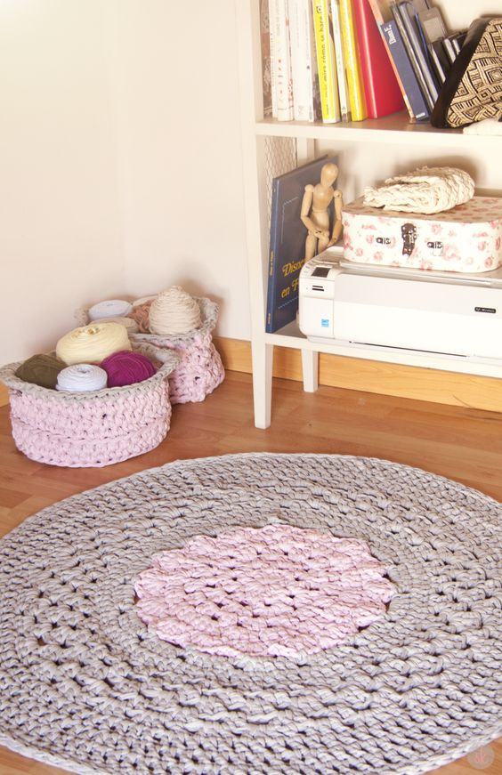 Another round rug with two colors, matching other crochet elements