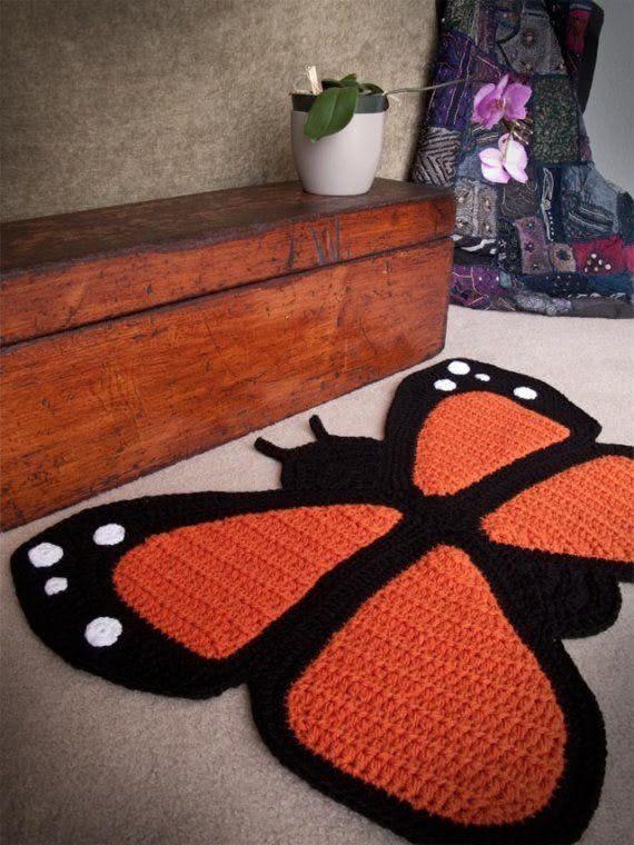 Crochet rug with butterfly shape