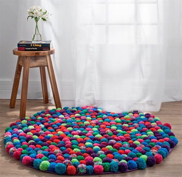 Crochet rug with colorful polka dots