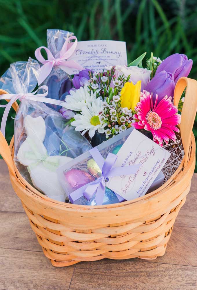 Easter basket for women with flowers and chocolates