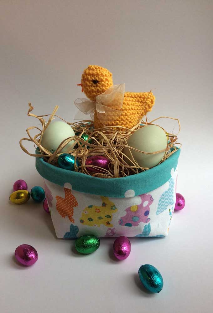 Small fabric Easter basket with chocolate eggs for children