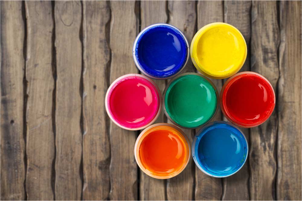 Paint cans on wood