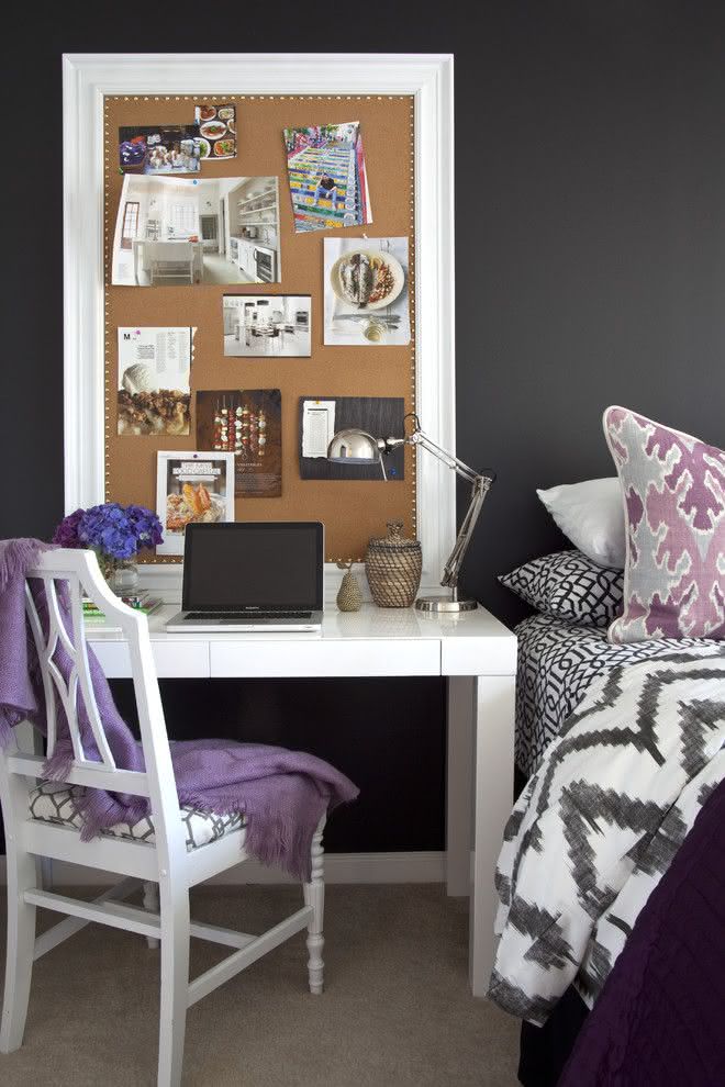 Dark gray wall decor and light furniture.