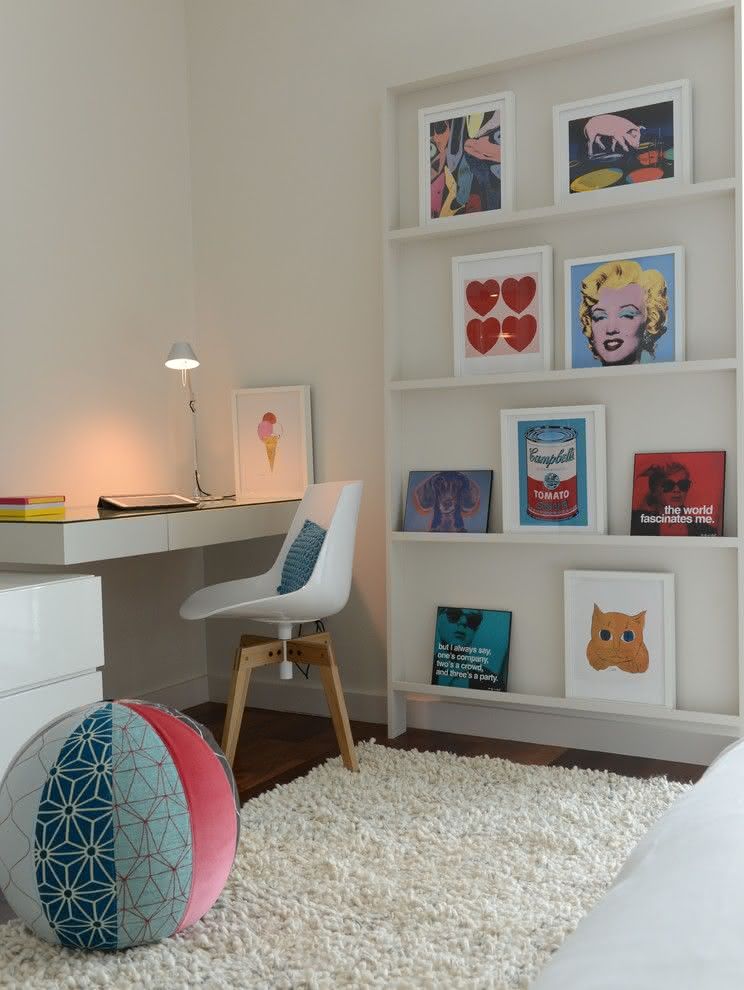 Minimally decorated room with pop art frames