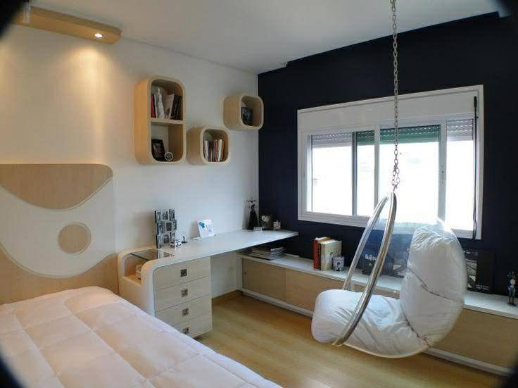 Room with acrylic pouf suspended from the ceiling.