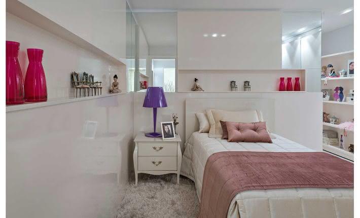 Teenager bedroom with mirror on the headboard