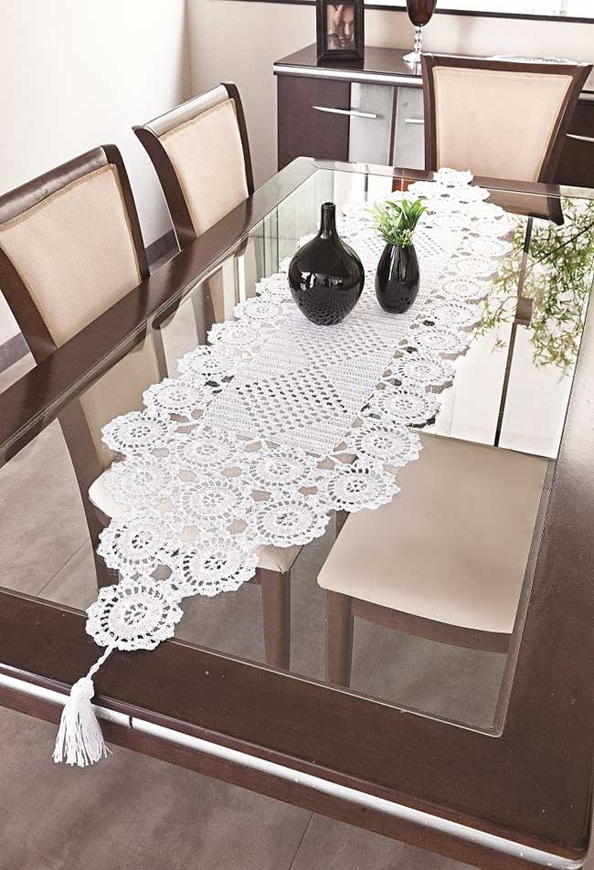 Dining table with crochet path and vases