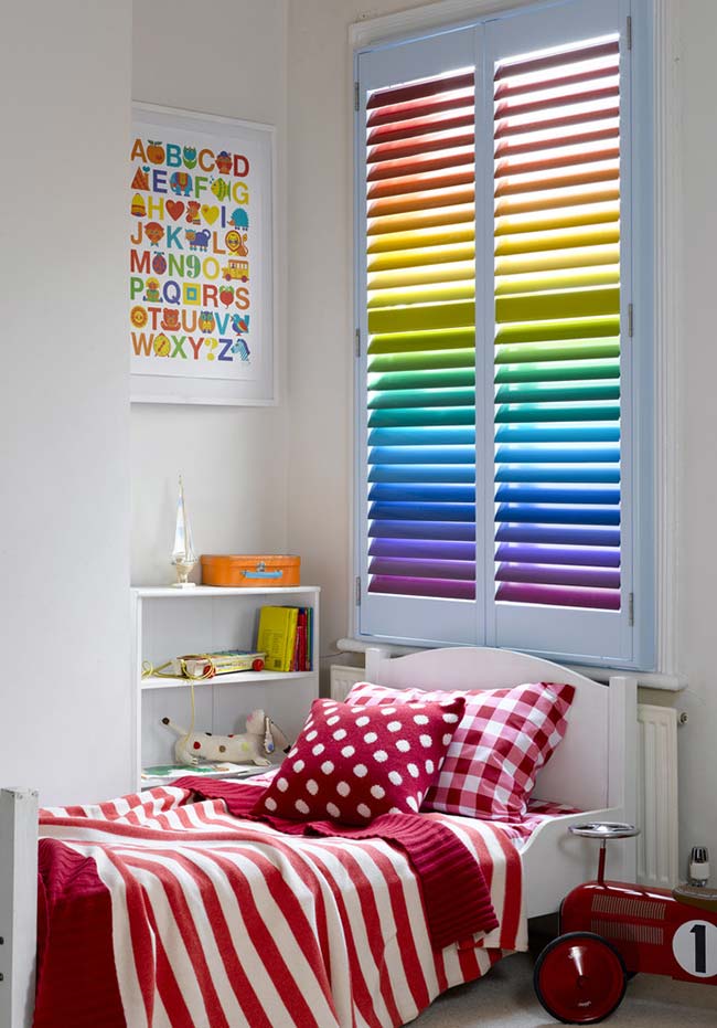 Colorful shutter with rainbow color gradient in girl's room decor