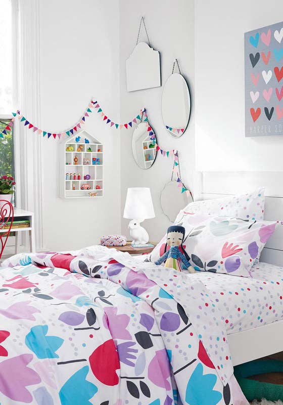 Flags and colorful bedding for the girl's room