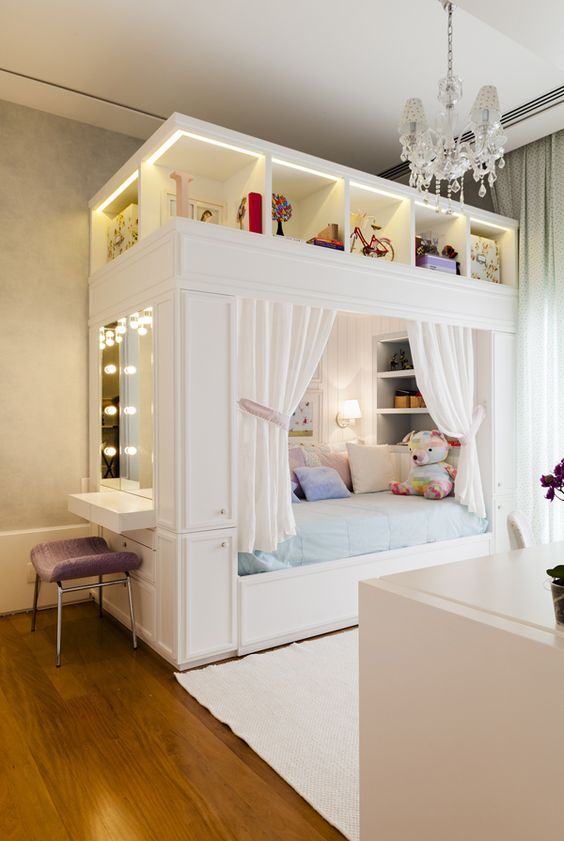 Girl's bedroom with dressing table built into the bed