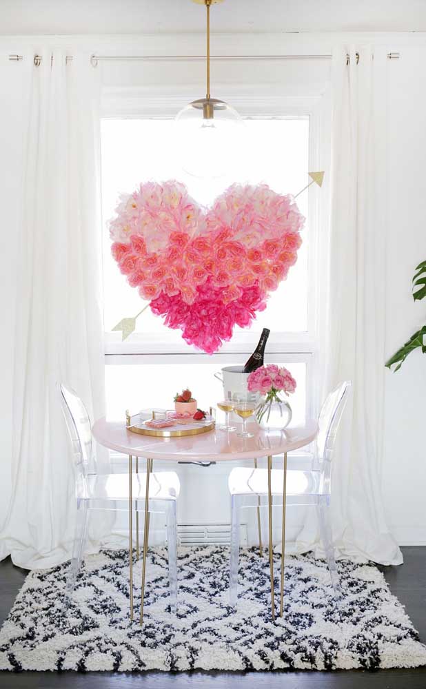 Table set to present the boyfriend with a romantic dinner; highlight for the giant heart made of flowers