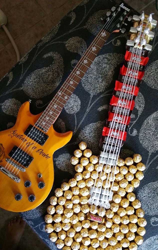 A creative idea where the shape of the guitar was completed by chocolates