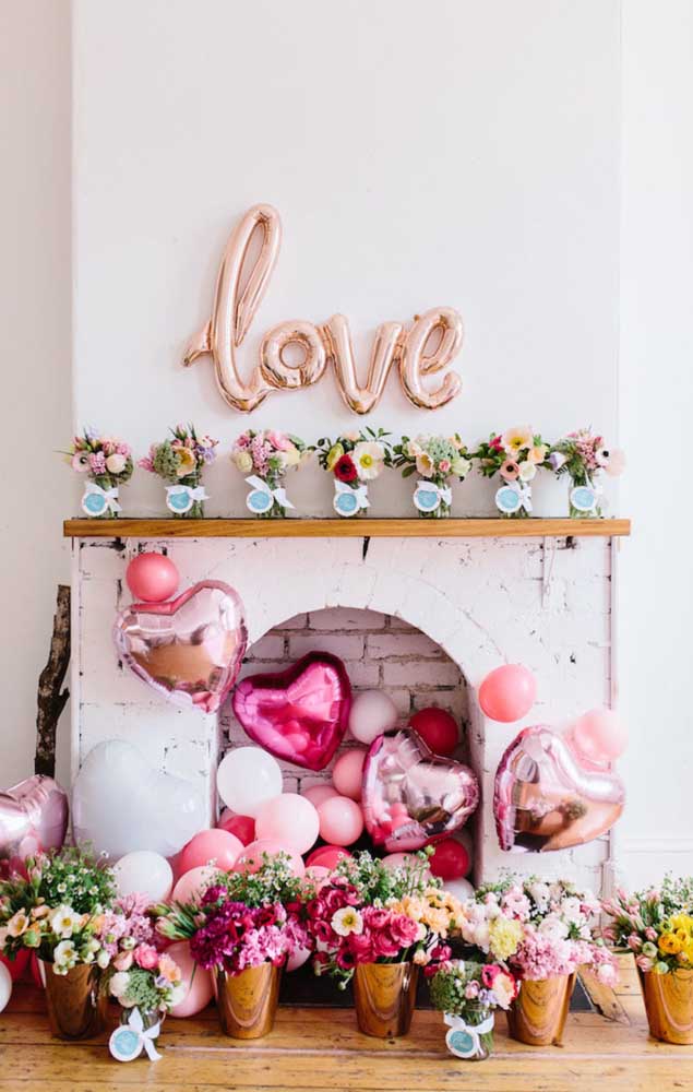 This surprise for her boyfriend happens by the beautifully decorated fireplace