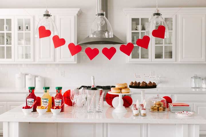 The table to receive friends at a surprise party for her boyfriend was beautiful and appetizing