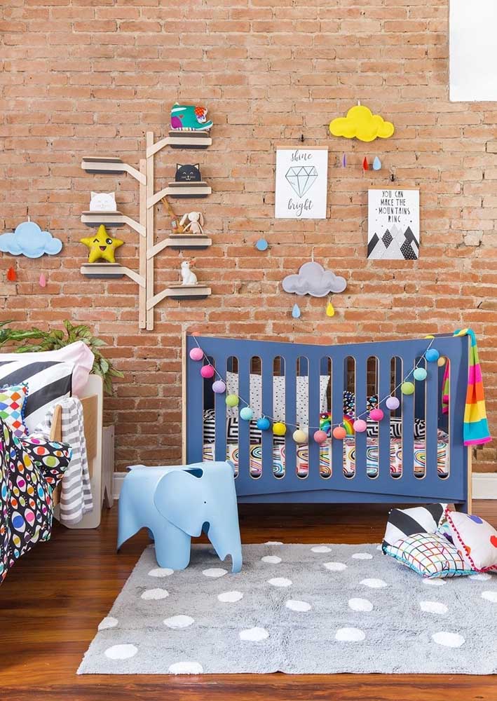 The exposed brick wall ensured a relaxed and cozy atmosphere for the baby's room