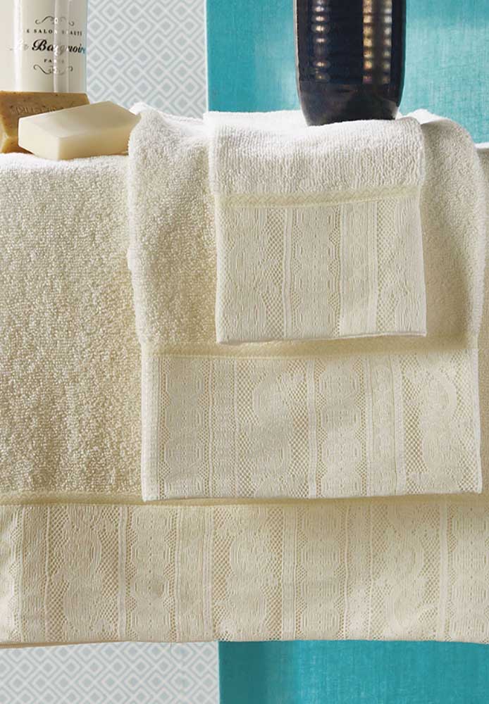 The delicate yellow towels have a special touch of lace in the same color