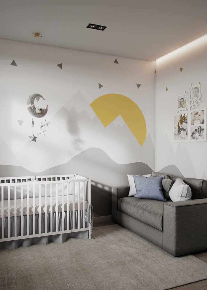 Modern male baby room in shades of gray and yellow. Highlight for painting on the wall