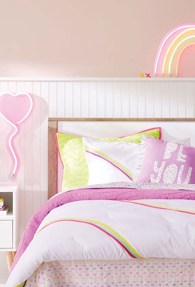 Youthful girl's bedroom with a touch of Rainbow Neon on the bed