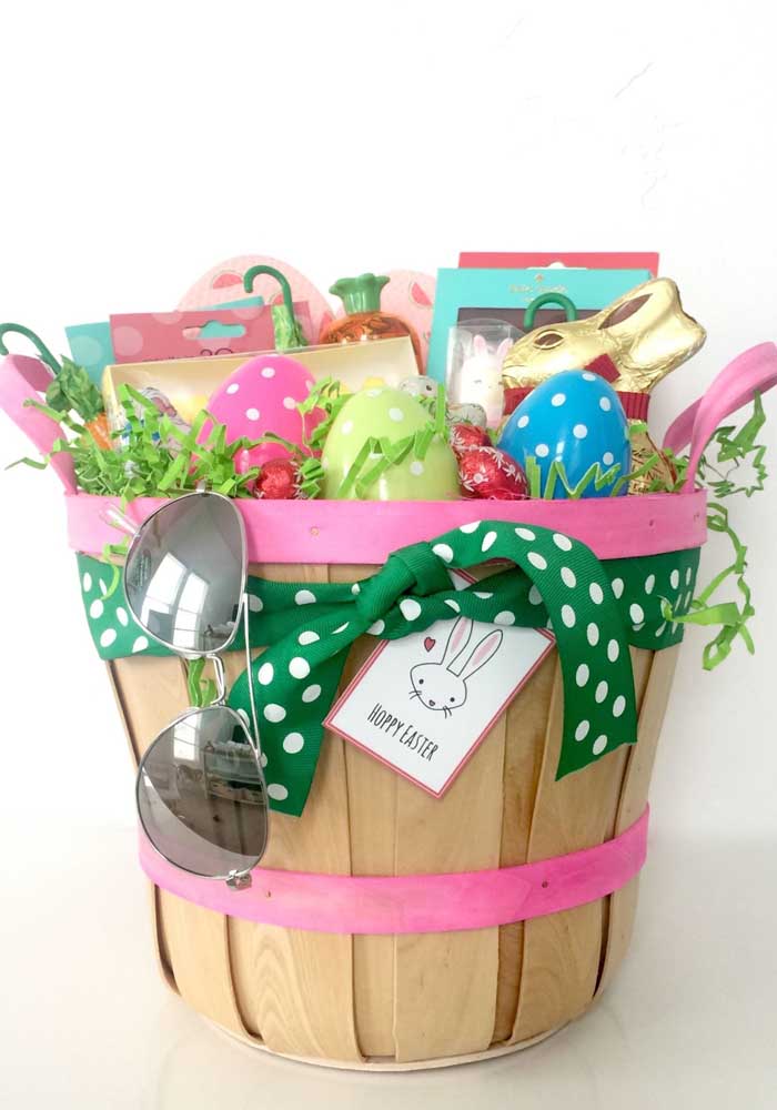 Small, simple and colorful Easter basket with eggs and chocolate bunny