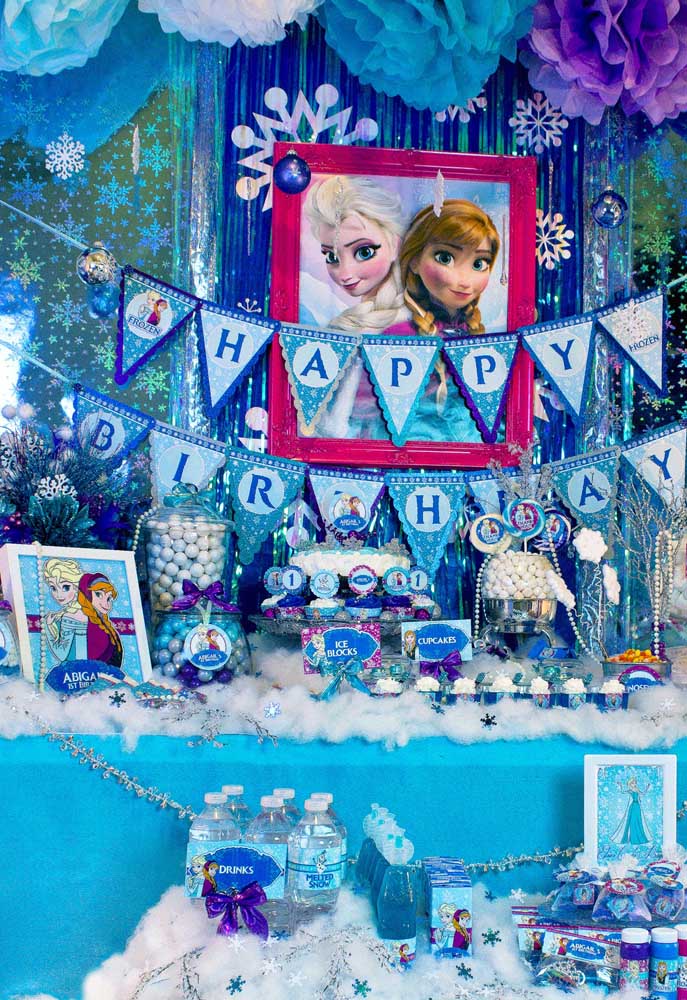 Frozen Table Cake Inspiration. Plenty of blue, lilac and silver to characterize the theme