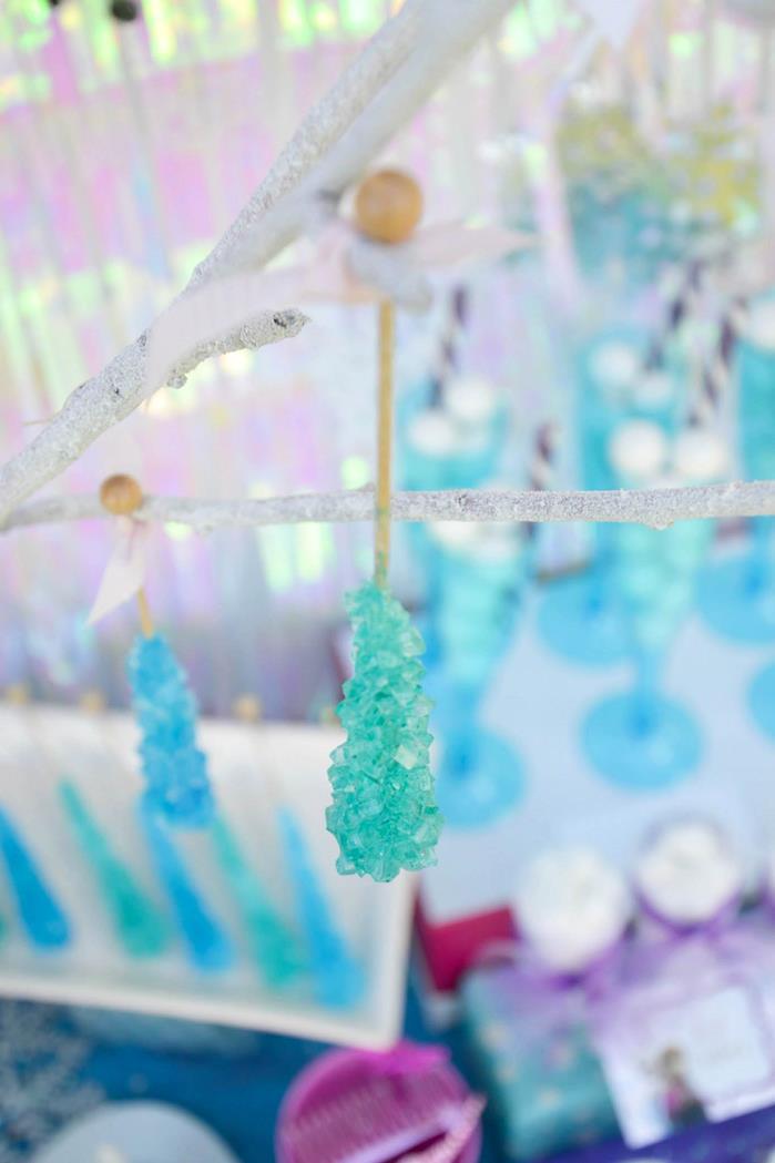 Hang lollipops with sugar crystals to emphasize the glacial temperature.