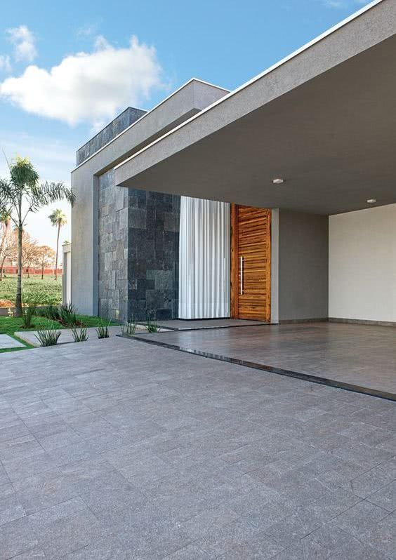 In this project, gray invades construction and landscaping