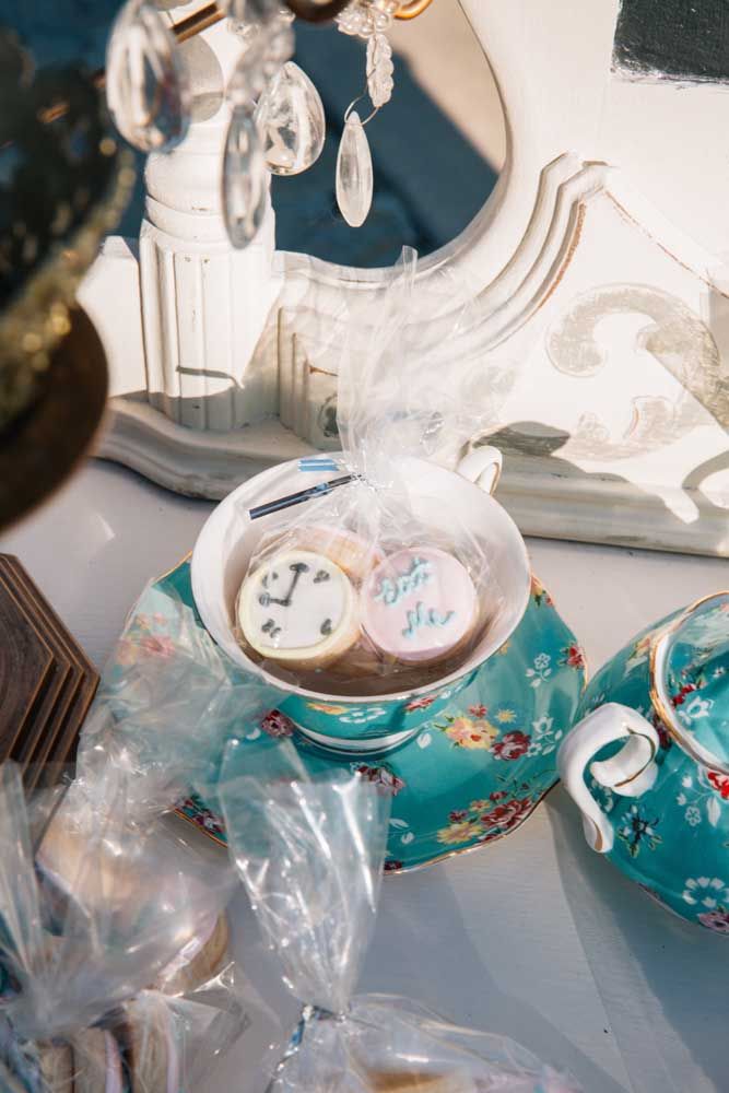 A passionate souvenir: cup of tea with decorated cookies
