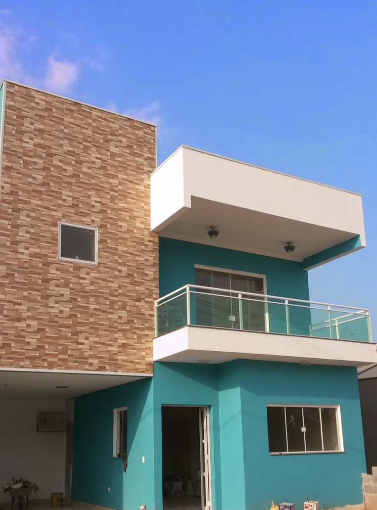 House colors with turquoise blue facade
