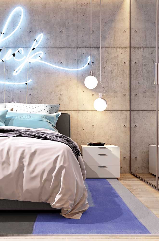 How about a neon sign on the bed? Super modern and charming!