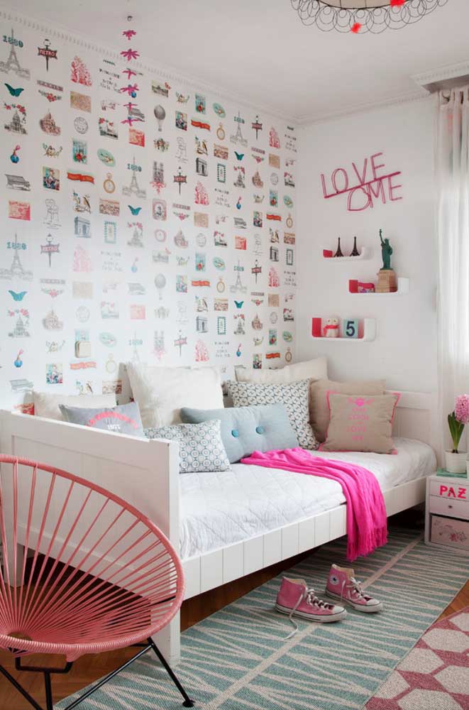 Youthful and modern female single room, highlighting the collage wall in the background