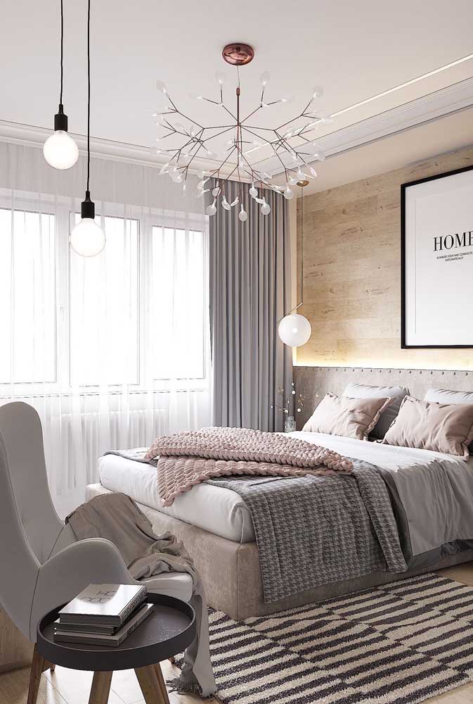 In this female room, the lighting project is reinforced by the LED strip on the headboard and by the pendant lamps