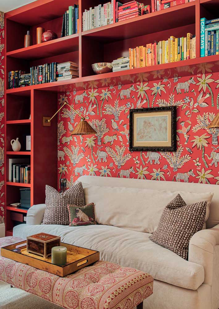 Here, red is accompanied by a delicate floral print. Red MDF niches complete the project